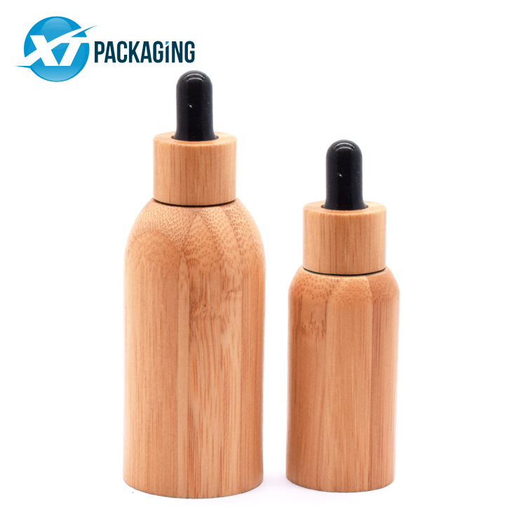 Custom 10ml 15ml 30ml 50ml 100ml 201ml bamboo Essential Glass Bottle for oil CBD oil child proof cap picture